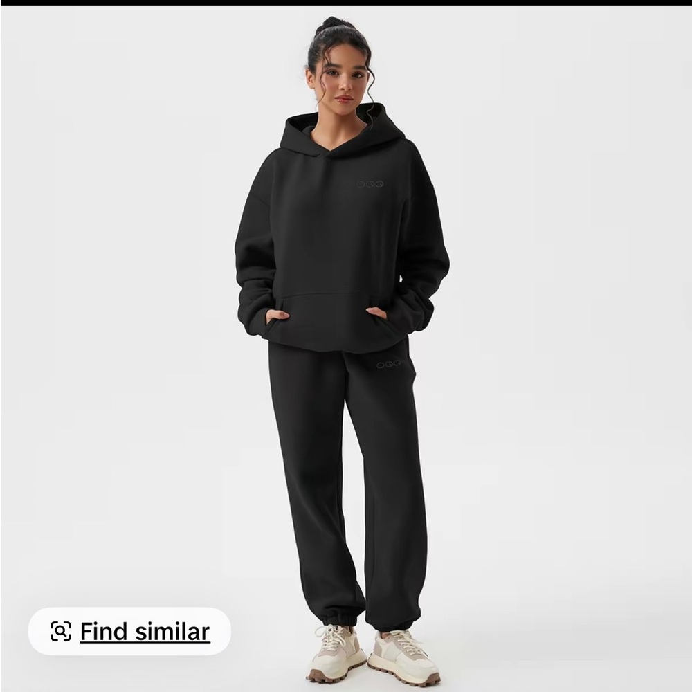 OQQ black sweatsuit size small. Brand new.